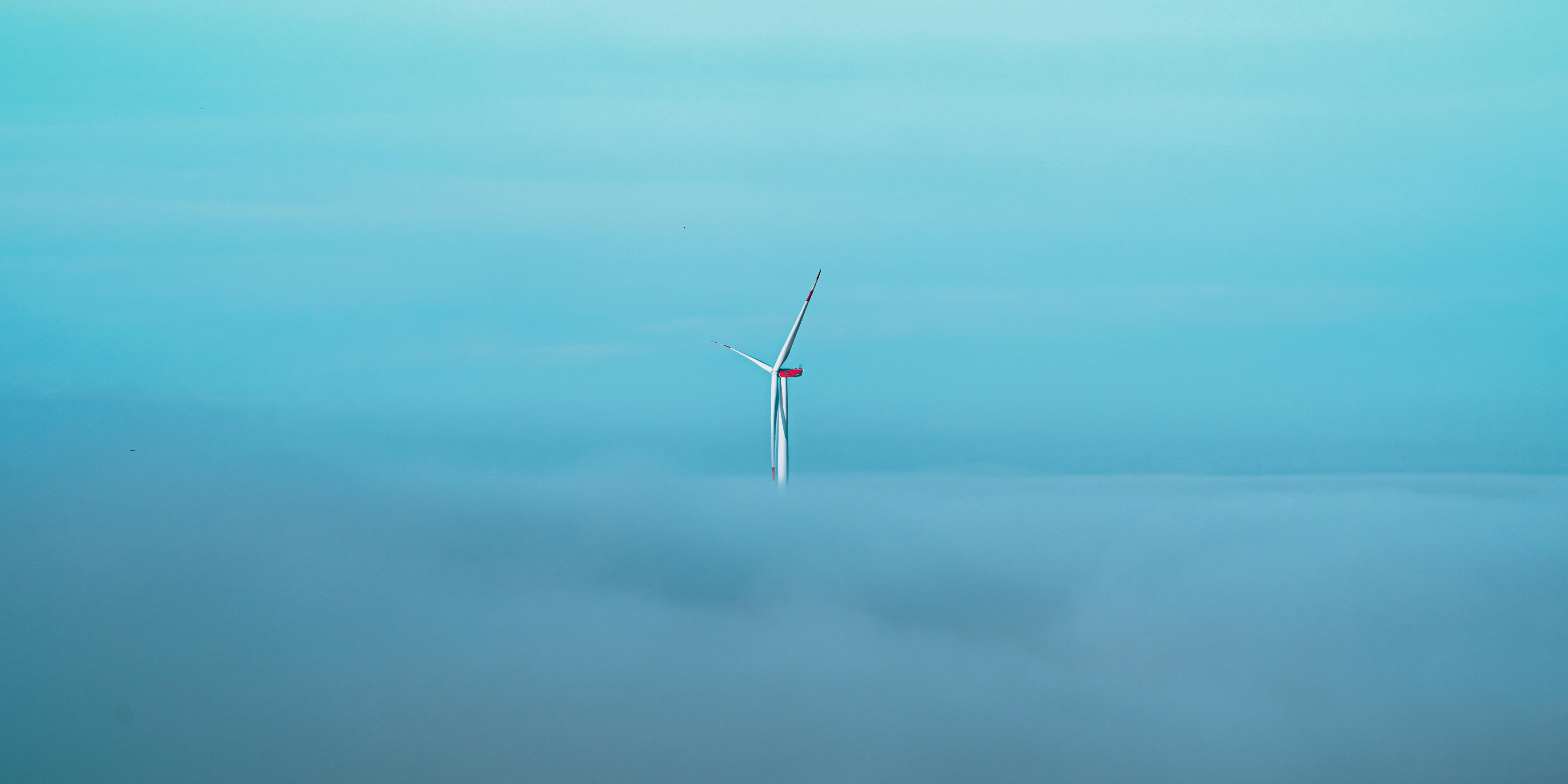 Offshore wind turbine above cloud cover